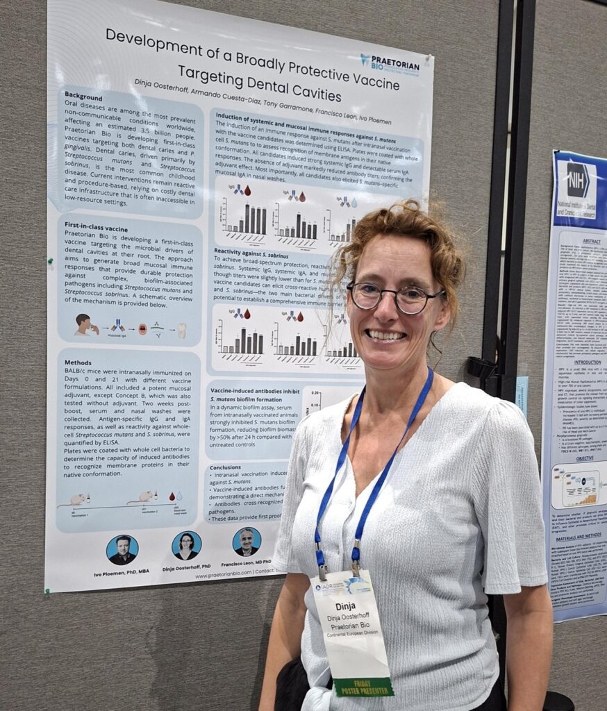Praetorian Bio CSO Dinja Oosterhoff presenting the CaviStop caries-vaccine poster at the IADR 2026 General Session, San Diego